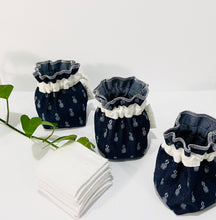 Charger l&#39;image dans la galerie, Three Pouches made of Denim with Pineapple pattern with a stack of white makeup remover pads
