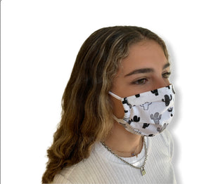 Teen girl wearing a Black Cactus on White ground face mask 