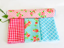 Load image into Gallery viewer, Three folded and one rolled towels with Roses and Checks patterns in Blue and Pink
