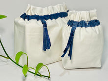 Load image into Gallery viewer, Two bags in off-white cotton with a Blue Denim trim. One bag is big and one small.
