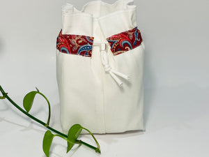One small bag in off-white cotton canvas with a Red Paisley trim