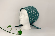 Load image into Gallery viewer, Left side view of Women cotton scrub cap Whit Cactus Pattern printed on Green

