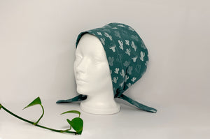 Left side view of Women cotton scrub cap Whit Cactus Pattern printed on Green