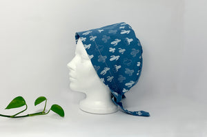 Left side view of Women cotton scrub cap Whit Cactus Pattern printed on Blue