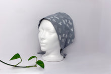 Load image into Gallery viewer, Left side view of Women cotton scrub cap Whit Cactus Pattern printed on Grey
