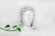 Load image into Gallery viewer, Front view of Scrub Cap with Black Flamingo print on White ground
