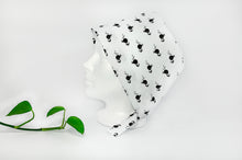 Load image into Gallery viewer, Left view of Scrub Cap with Black Flamingo print on White ground
