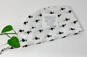 Folded Scrub Cap with Black Flamingo print on White ground