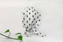 Load image into Gallery viewer, Back view of Scrub Cap with Black Flamingo print on White ground
