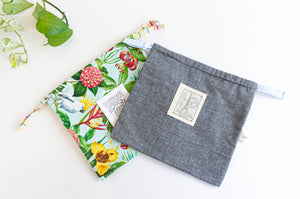 Two square bags with various patterns