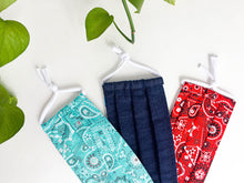 Load image into Gallery viewer, Closeup ofThree face mask, one Denim fabric, one Red Paisley print and one Aqua Paisley print
