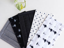 Load image into Gallery viewer, Closeup of Five face mask in assorted colours and prints all Black and White
